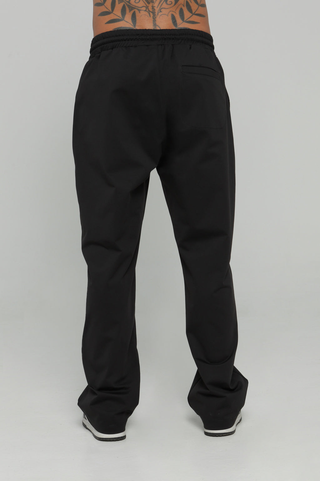 Pantalón bolsillo posterior
