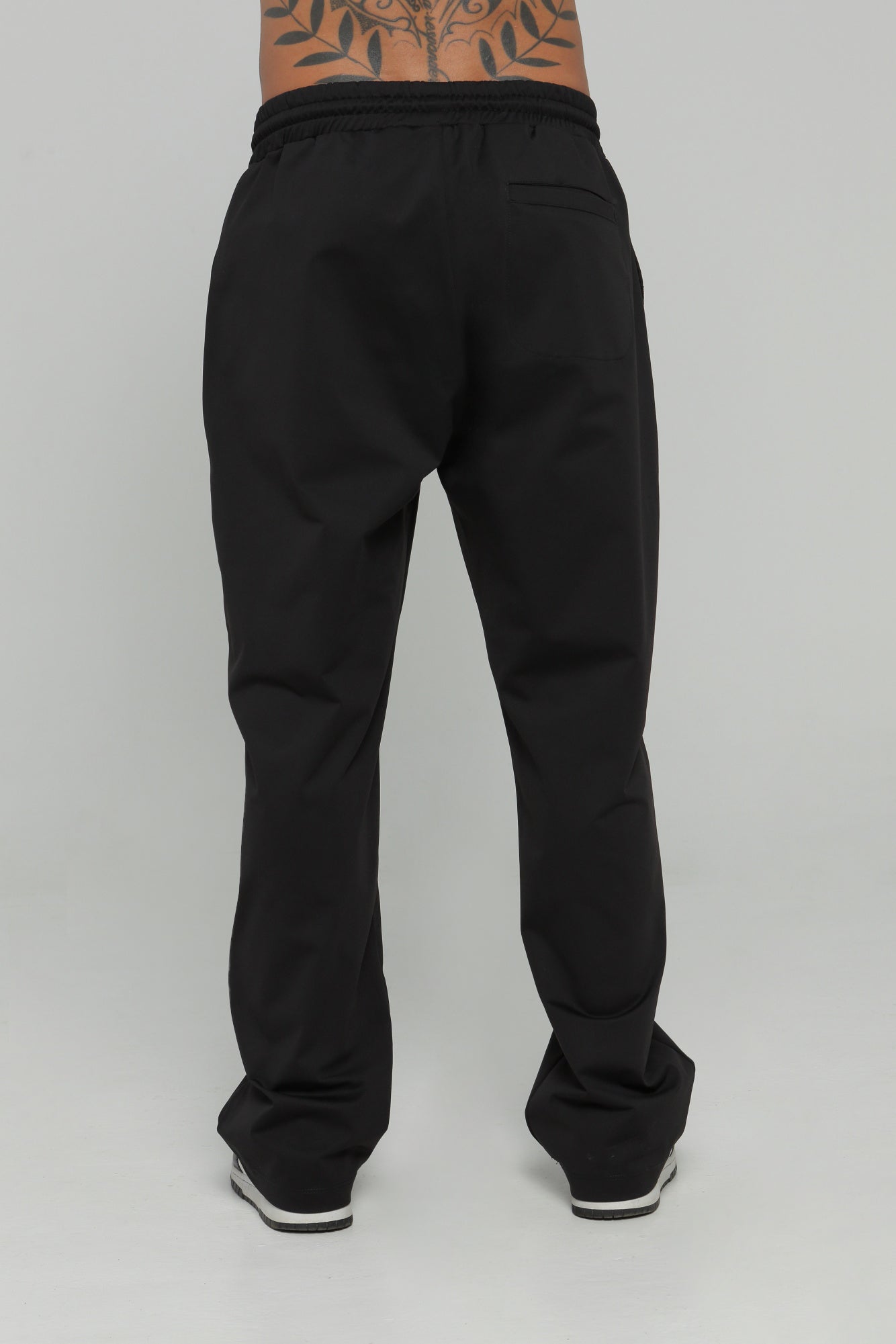 Pantalón bolsillo posterior