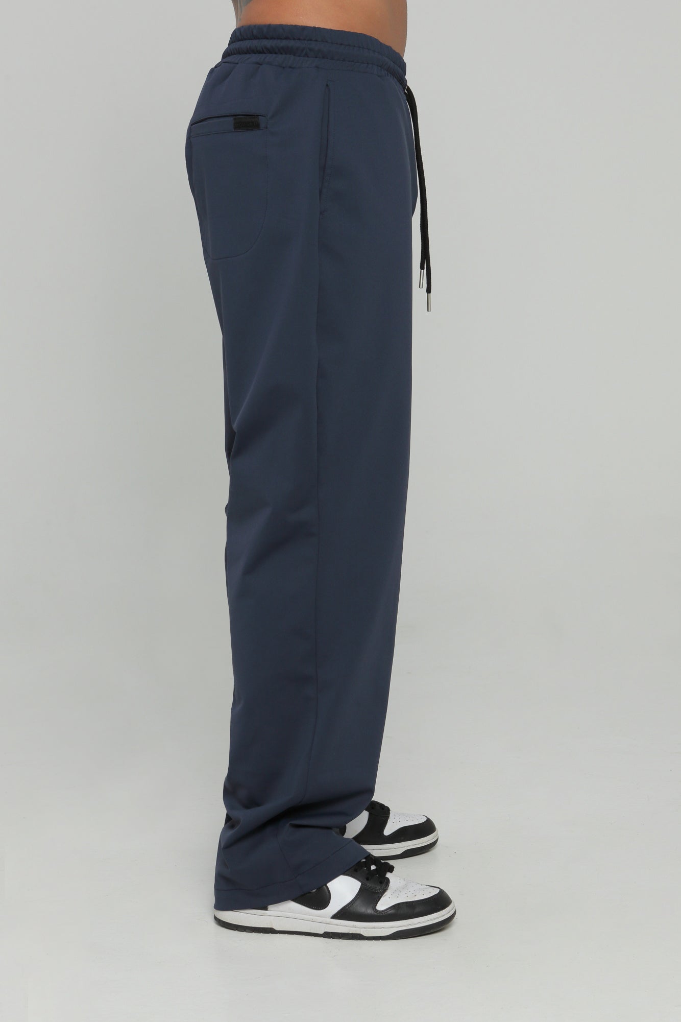 Pantalón bolsillo posterior