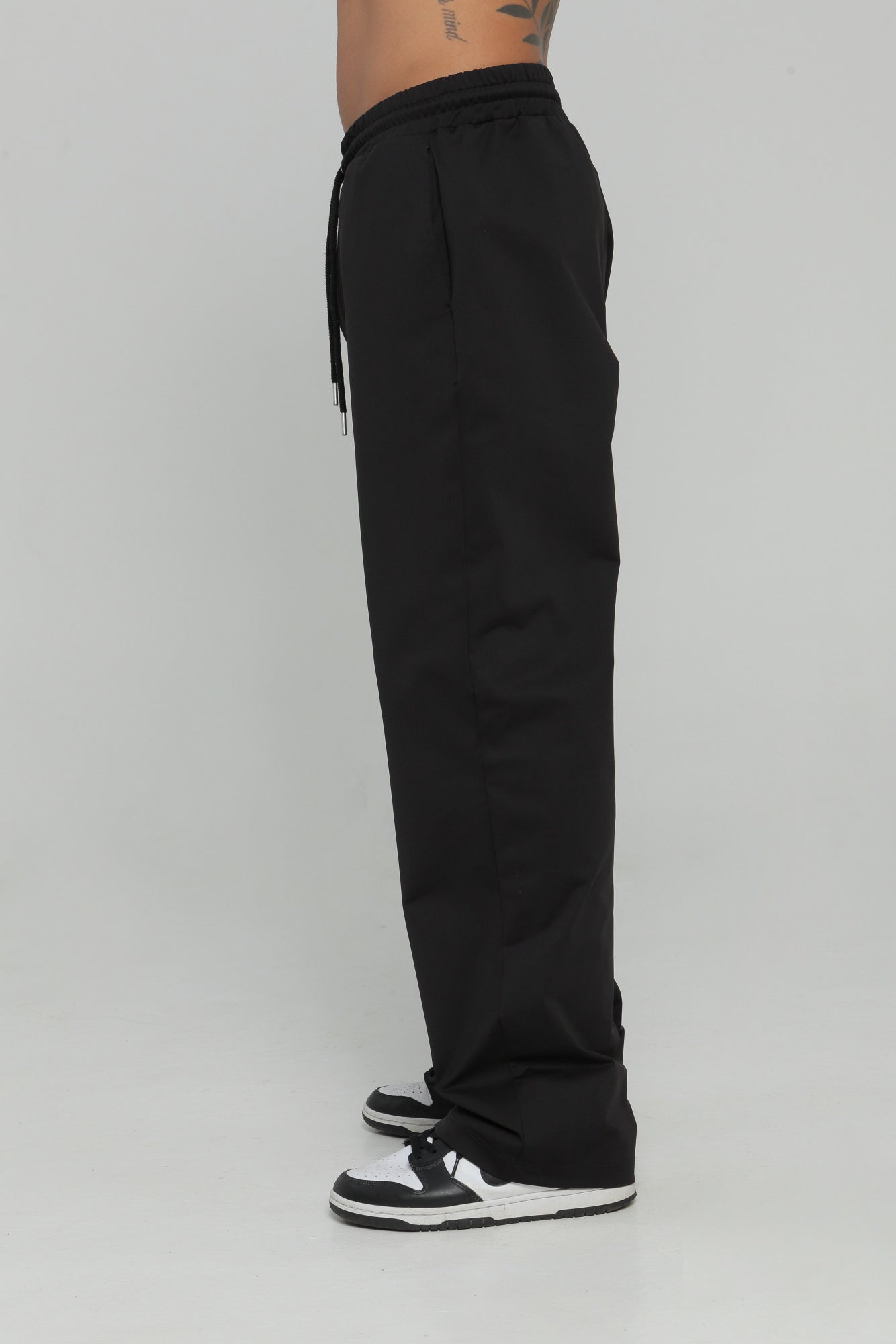 Pantalón bolsillo posterior
