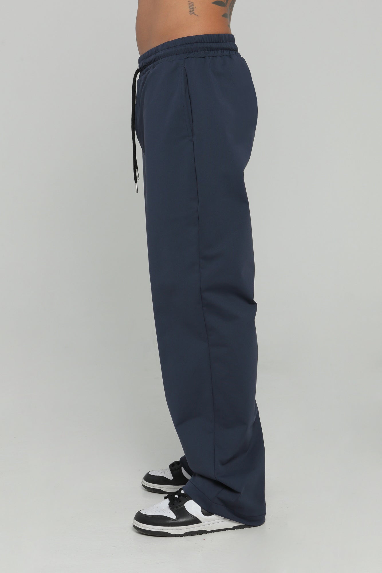 Pantalón bolsillo posterior
