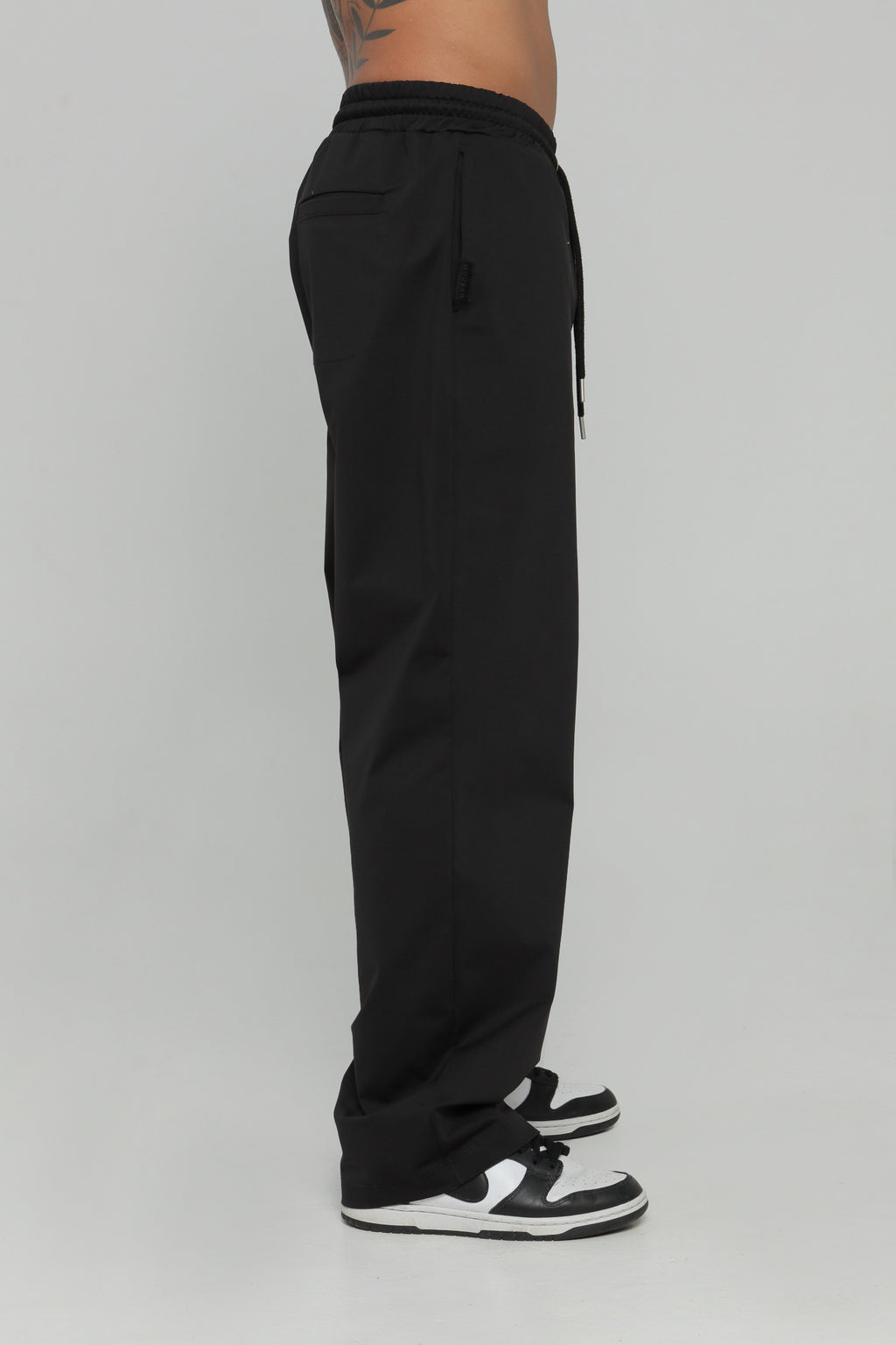 Pantalón bolsillo posterior