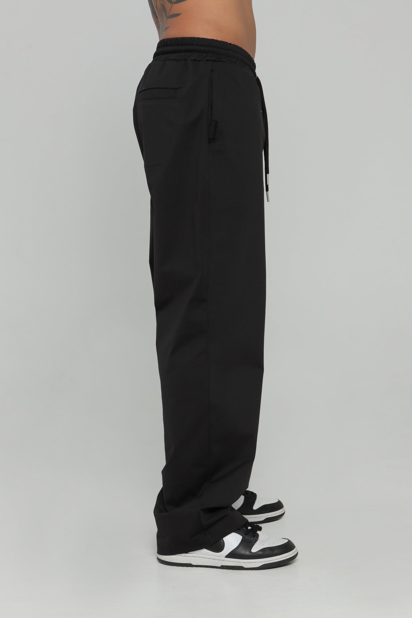 Pantalón bolsillo posterior