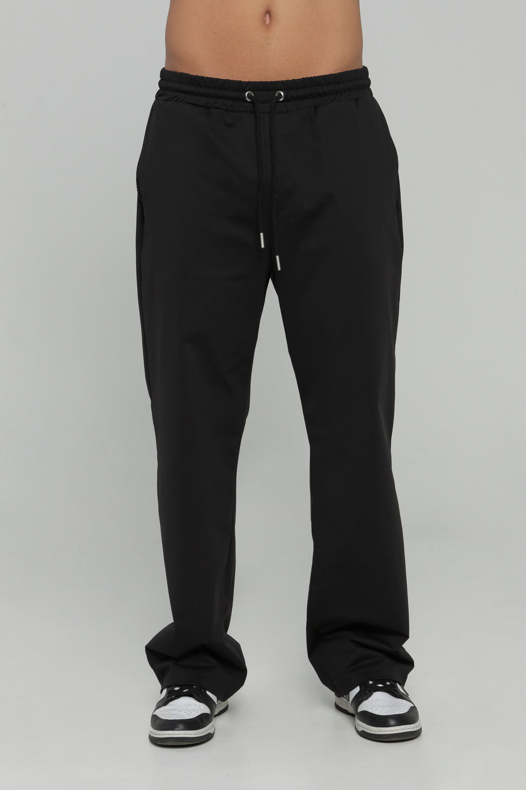 Pantalón bolsillo posterior