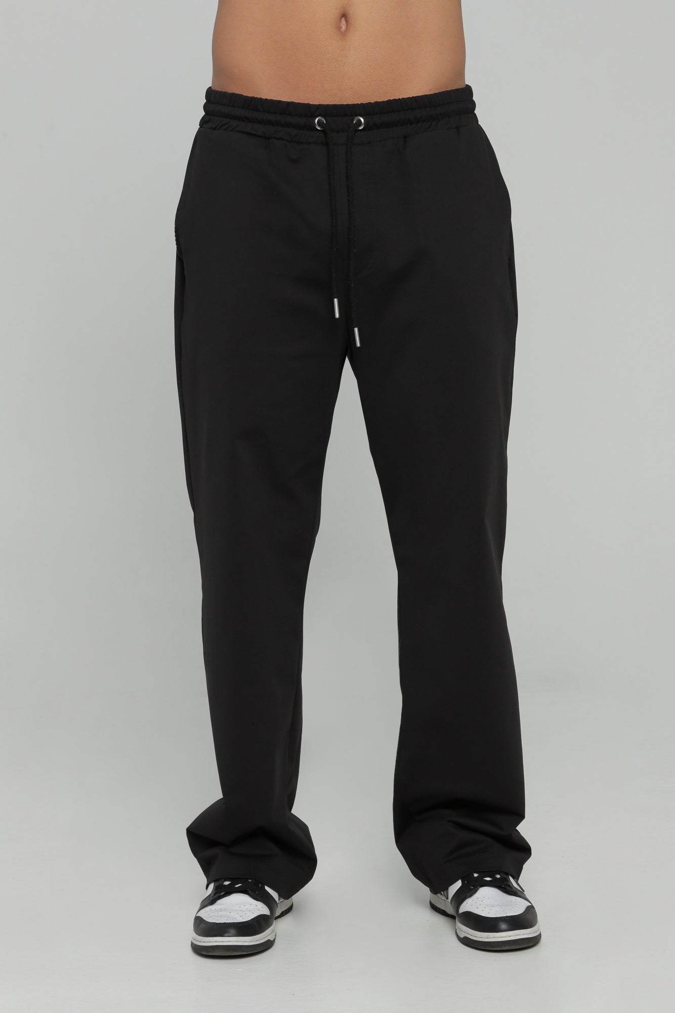 Pantalón bolsillo posterior