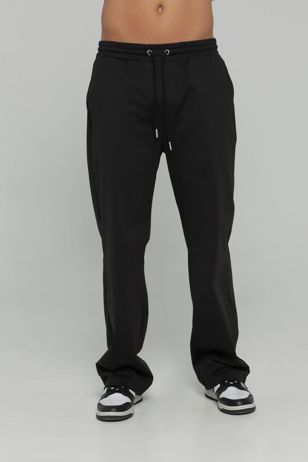 Pantalón bolsillo posterior