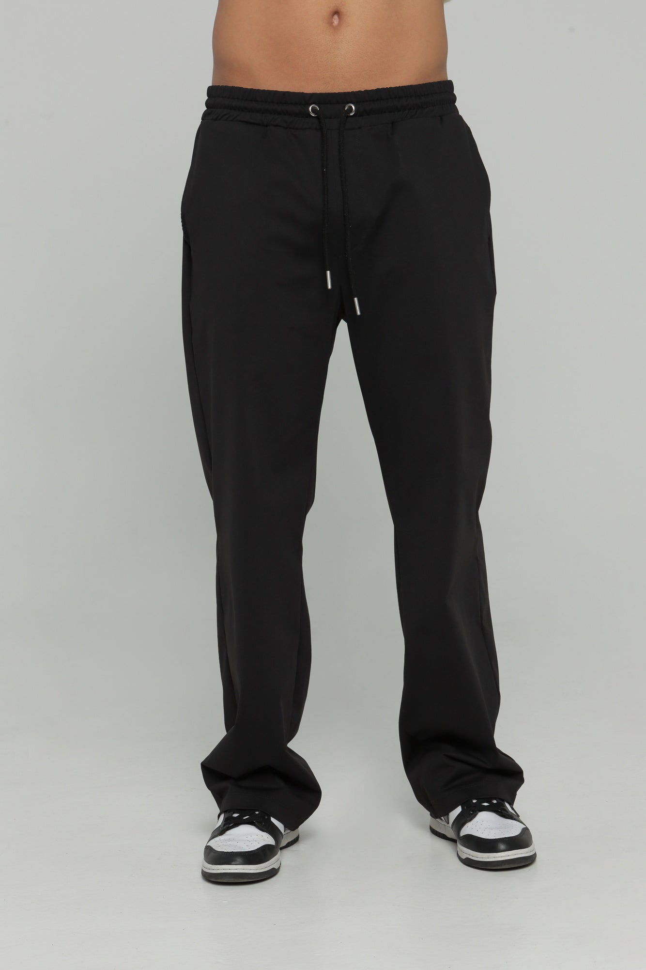 Pantalón bolsillo posterior
