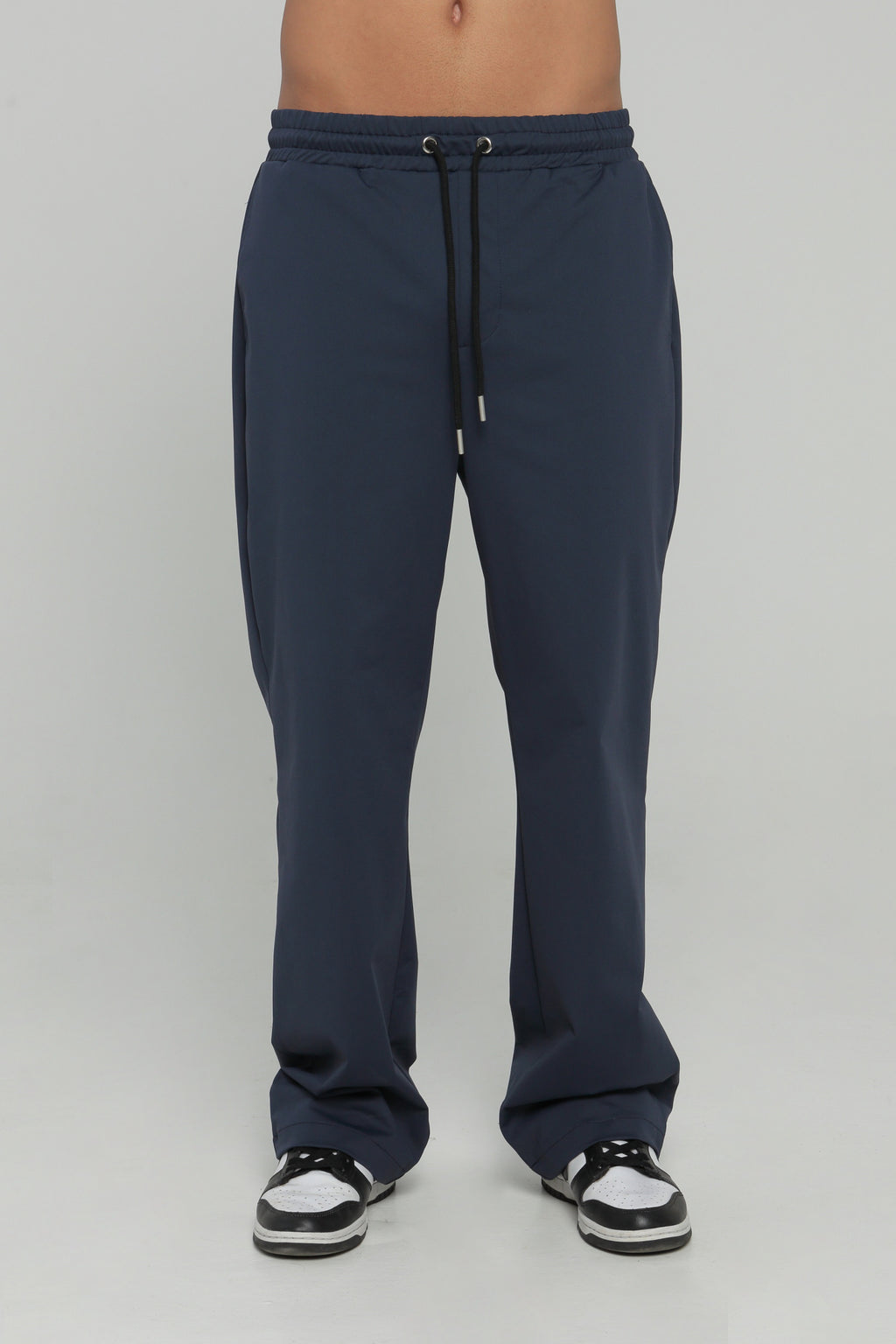 Pantalón bolsillo posterior