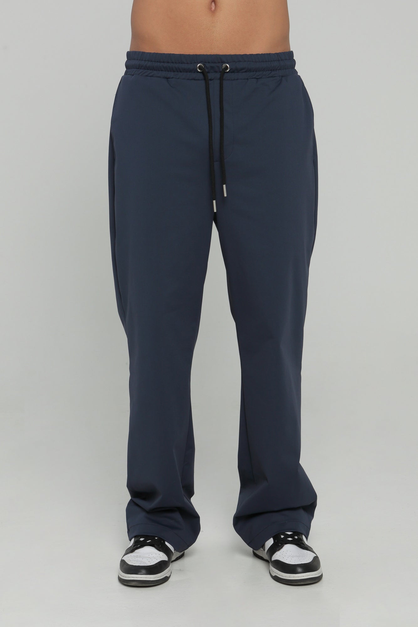 Pantalón bolsillo posterior
